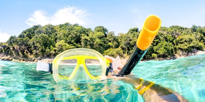 adventurous-guy-taking-photo-of-snorkeling-mask-un-2024-07-03-02-44-12-utc-scaled